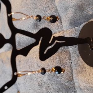 10k yellow gold and black dangle earrings